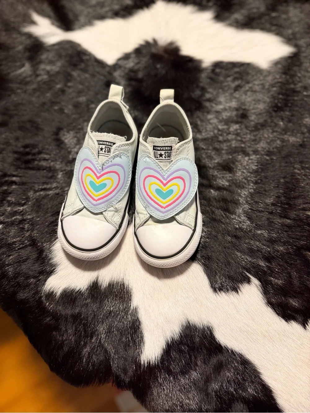 Converse Kids White Slip-On Sneakers with Rainbow Heart Velcro Patch